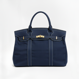 Efektowna torebka damska typu tote z eleganckim wykończeniem